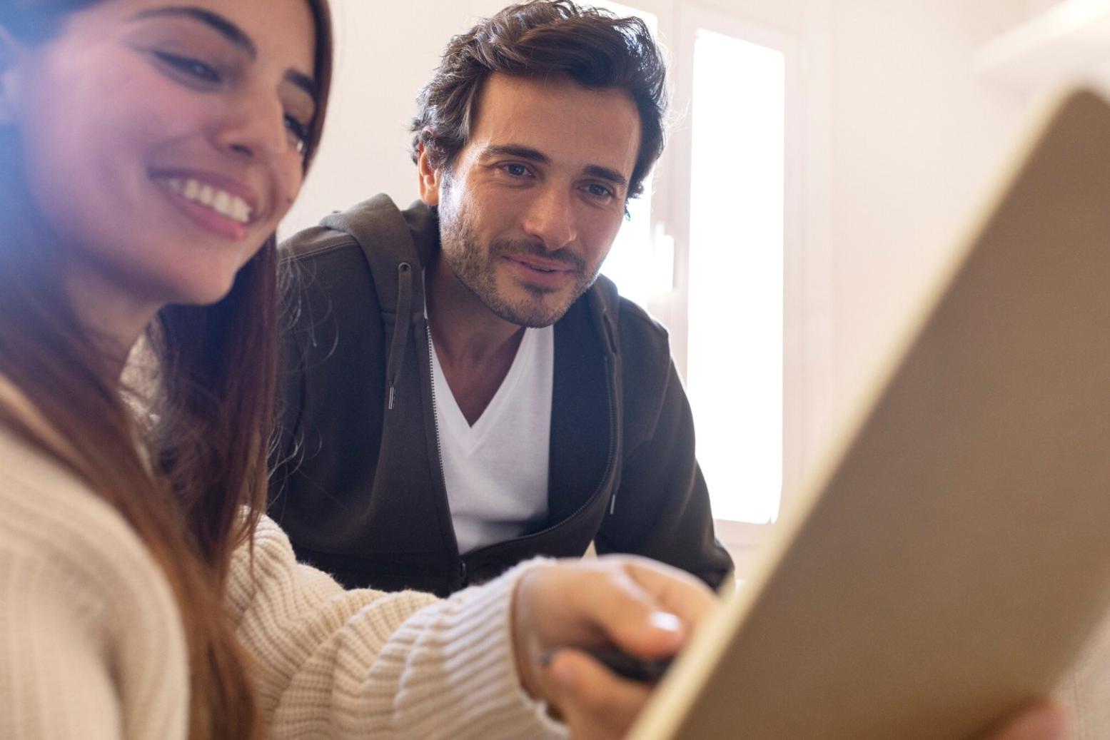 Interactive workshop session with business owners reviewing financial documents